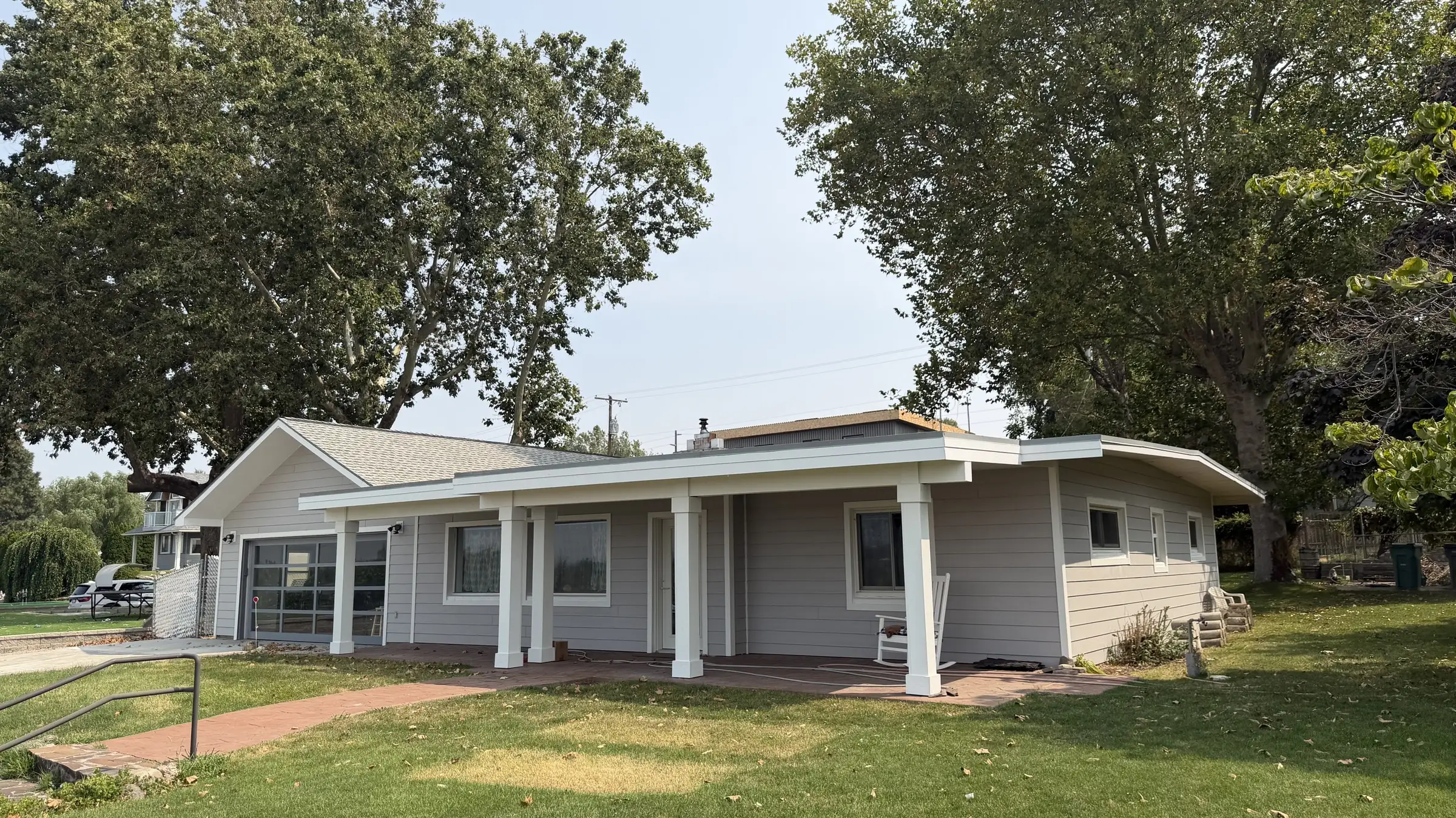 A Tri-Cities home with a completed exterior, seen from the front lawn