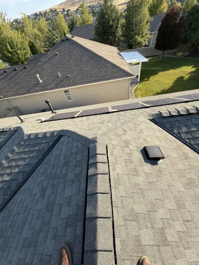 Grey shingle, vent penetration and the neighbouring roof plane