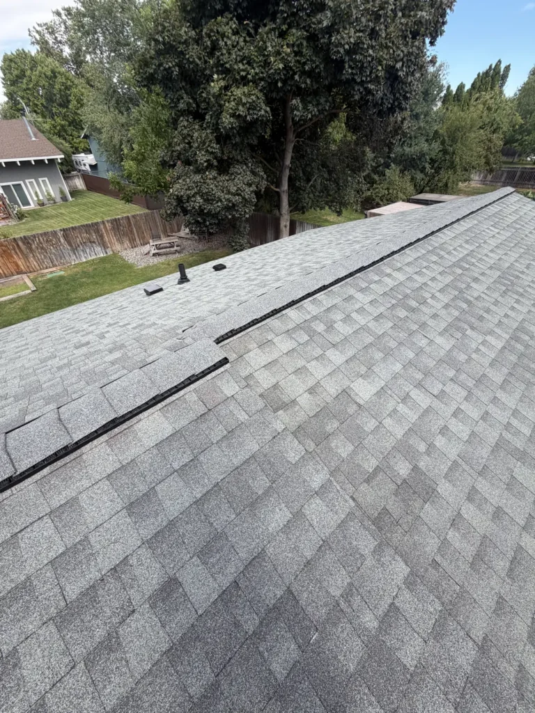 Shingle plane, fence line and the patio below